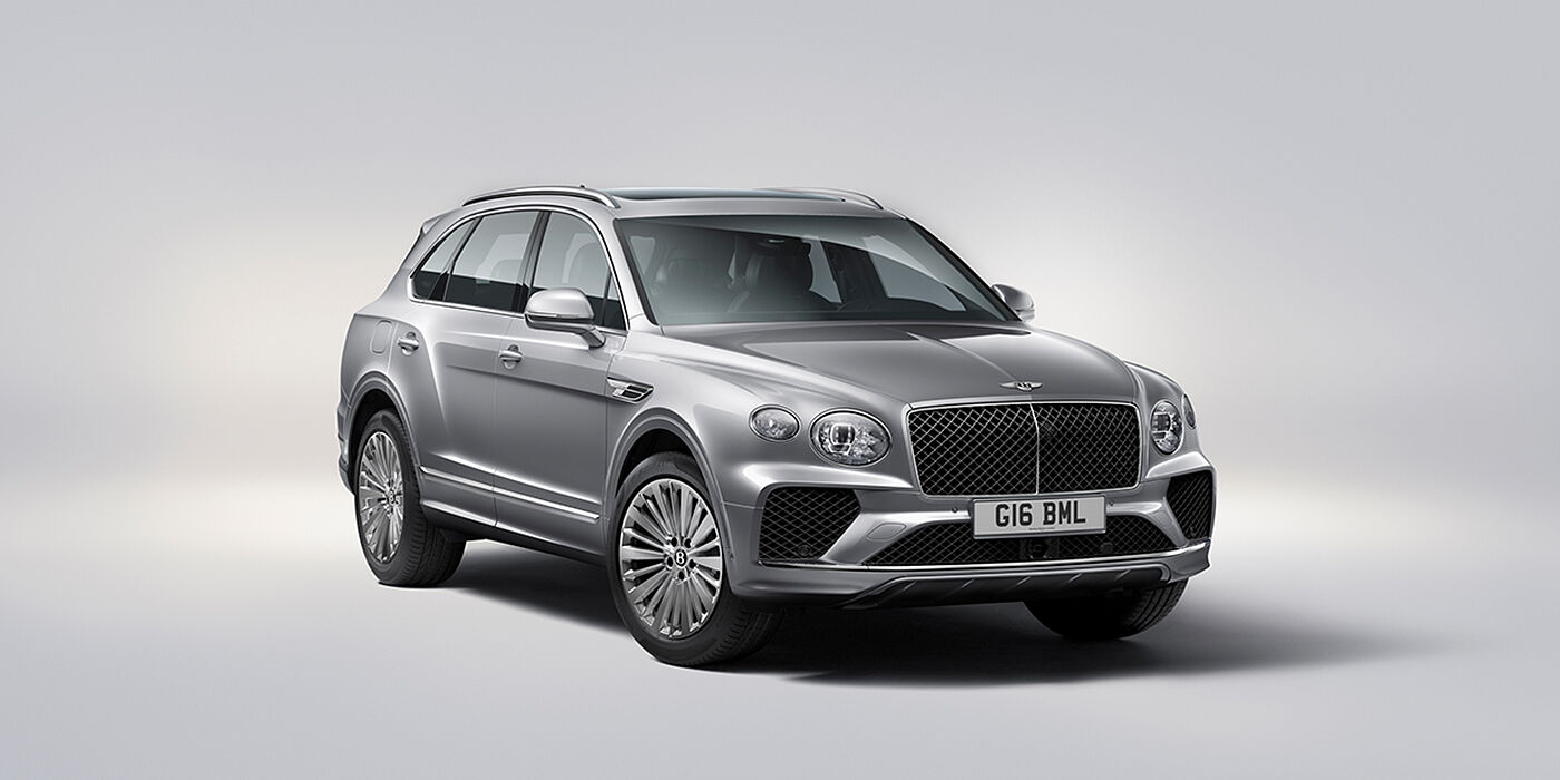 Bentley Macau Bentley Bentayga luxury SUV front three quarter view in Moonbeam paint with matrix grille and 21″ 5 spoke painted wheels