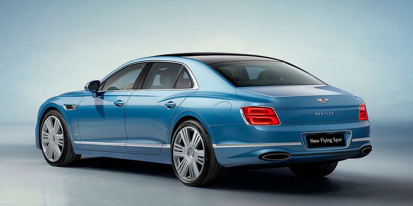 Bentley Macau New Bentley Flying Spur Azure sedan rear view in Light windsor blue by Mulliner paint with 22 inch Azure wheels and chrome exterior details