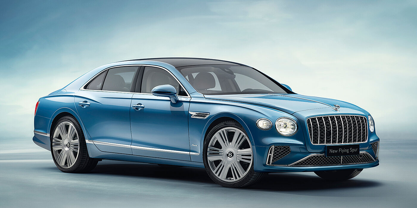 Bentley Macau New Bentley Flying Spur Azure sedan front view in Light windsor blue by Mulliner paint with 22 inch Azure wheels and chrome exterior details